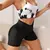Short Fitness Canelado Com Bolsos Laterais
