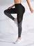 Calça Legging com Recortes Com Bolsos Laterais cintura alta, bunda push.