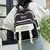 Mochila Monday Lucy