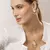 Brinco Gota Com Pedra Natural Madreperola Banhado a Ouro 18k - comprar online