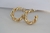 Argola Média Torcida Banho de Ouro 18k - comprar online