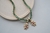Choker Riviera Esmeralda Três Pontas Banho de Ouro 18k na internet