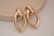 Brinco Gota Oval Vazada Banho de Ouro 18k - comprar online