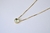 Colar Ponto de Luz Azul Claro Banho de Ouro 18k - comprar online