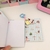 Caderno-Chaveirinho  Meu Devocional - Fofura para levar sempre com você! 
Super práticos, fofos e perfeitos para pendurar na mochila, bolsa ou estojo!  Os Cadernos-Chaveirinhos são um verdadeiro mimo, com estampas encantadoras e um charmoso pingente.