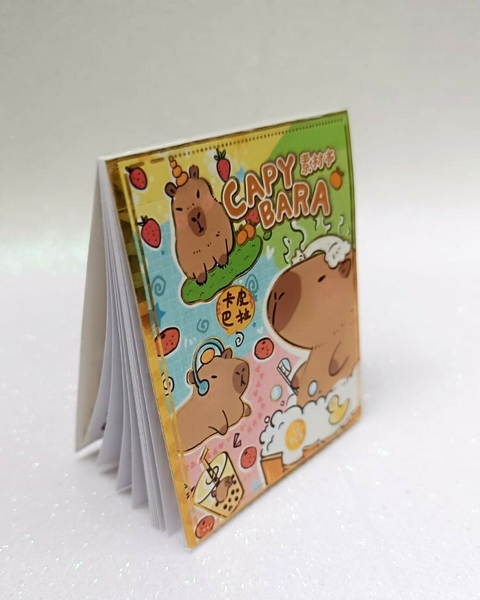 Bloco de Adesivos Capivara - 12 Folhas
Adicione um toque de fofura à sua rotina com nosso Bloco de Adesivos Capivara!
Com 12 folhas no tamanho 7,5 x 9 cm, esses adesivos são perfeitos para personalizar seu caderno, planner ou qualquer projeto criativo.