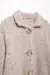 Chaqueta de punto con botones de flores dorados. en internet