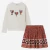 Conjunto playera con pompones y falda estampada marca Mayoral para niña junior