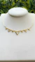 choker perspectiva triangular dourado