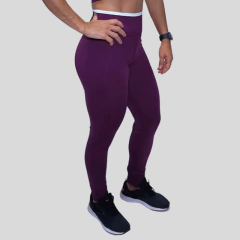 Conjunto legging e top off com roxo na internet