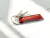 Chaveiro personalizado vermelho com abridor e logo