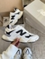 Imagem do New Balance 9060 couro Branco/Preto