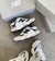 New Balance 9060 couro Branco/Preto na internet