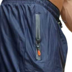SHORTS DRY FIT PLUS COM ZIPER NO BOLSO na internet