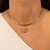 PINGENTE OVAL CRAVEJADO DOURADO - comprar online