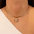 PINGENTE OVAL CRAVEJADO DOURADO - comprar online