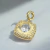 PINGENTE OVAL CRAVEJADO DOURADO