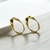 BRINCO OVAL FITA LISO DOURADO