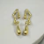 BRINCO ORGANICO LONGO DOURADO G
