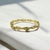 BRACELETE TORCIDO FLORES DOURADO