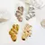 Brinco EarCuff Flor de Texturas - Banho de Ouro 18k - comprar online