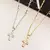 Corrente Masculina Elo Piastrine Fino com Cruz Vazada com Riscos - 70cm - Banho de Ouro 18K - comprar online