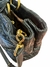Bolsa Miu Miu preta de couro
