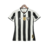 Camisa Botafogo Home 2024/25 Feminina Reebok – vista frontal listrada preto e branco com gola V e Patch Campeão Brasileiro