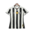 Camisa Botafogo Home 2024/25 Feminina Reebok – vista frontal listrada preto e branco com gola V e Patch Campeão da Libertadores
