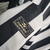 Detalhe etiqueta fornecedor da camisa Botafogo retrô 99/00 com acabamento clássico