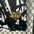 Selo Aura 90 comemorativo na barra da camisa Botafogo 25/26