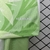 Kit Infantil Itália Away 2025/26 Verde Uniforme III Seleção Italiana de futebol. Detalhe tecido aeroready