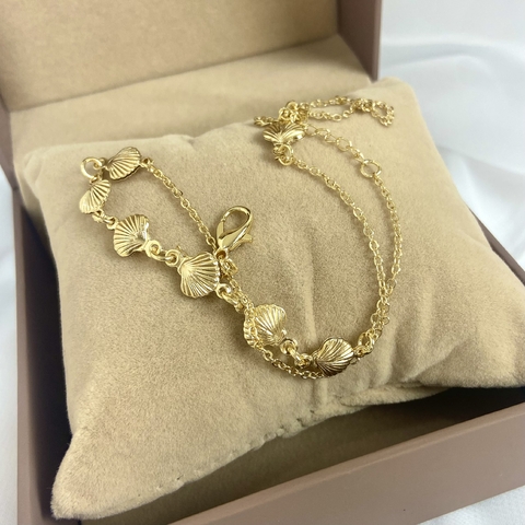 Pulseira de conchinhas
