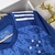 Camisa Azul do Cruzeiro I 24/25, modelo torcedor Adidas, com detalhes em estrelas e listras brancas.