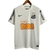 Camisa branca do Santos Futebol Clube, modelo retrô, com patrocinadores e logo da Nike.