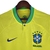 Camisa amarela da Seleção Brasileira de Futebol feminina, com detalhes em azul e verde, e o logo da CBF.