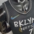 Camiseta regata preta do Brooklyn Nets, edição City, da Nike, com detalhes em azul e branco.