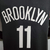 Camiseta regata preta do Brooklyn Nets com o número 11 nas costas