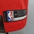 Etiqueta da camiseta regata vermelha do Chicago Bulls, mostrando detalhes da marca Nike e informações de tamanho.