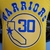 Camiseta regata amarela e azul do Golden State Warriors com a inscrição "30" e logotipo da equipe.