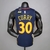 Camiseta regata azul e laranja do Golden State Warriors, com o nome "Curry" e número 30, vista de trás.