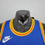 Camiseta regata azul do Golden State Warriors, modelo masculino da Nike, com detalhes em amarelo e vermelho.