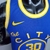 Camiseta regata azul dos Golden State Warriors com detalhes em amarelo e logo da Nike