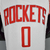 Camiseta regata branca do Houston Rockets com a numeração 0, fabricada pela Nike.