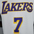 Camiseta regata branca dos Los Angeles Lakers com o número 7 em destaque.