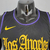 Camiseta regata preta dos Los Angeles Lakers, fabricada pela Nike, com detalhes em amarelo e roxo.