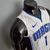 Camiseta regata branca do Orlando Magic, modelo masculino, com detalhes em azul e logo da Nike.