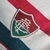 Detalhe do escudo do Kit Infantil Fluminense II Umbro 23/24 na cor branca.