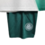 Kit infantil do Palmeiras II 23/24, composto por camiseta branca e bermuda verde com logo do Palmeiras.