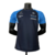 Camisa masculina azul da Williams Racing 23/24, com detalhes em azul claro e logos de patrocinadores.